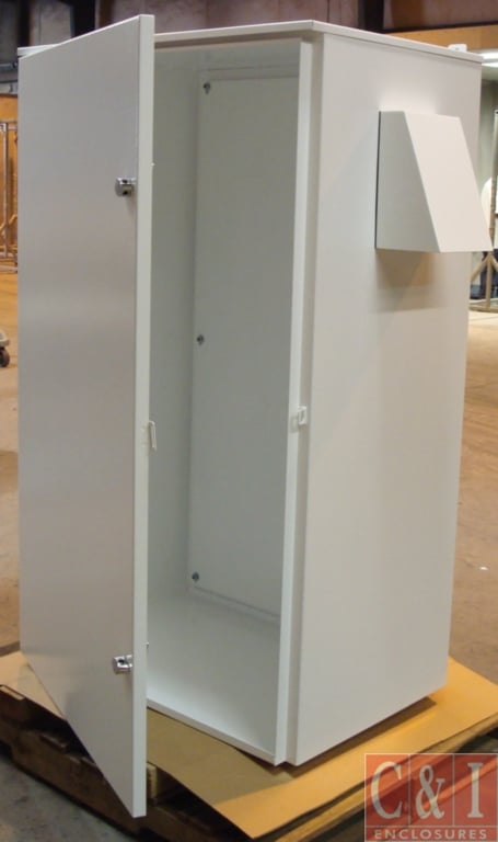 a refrigerator freezer sitting in a room